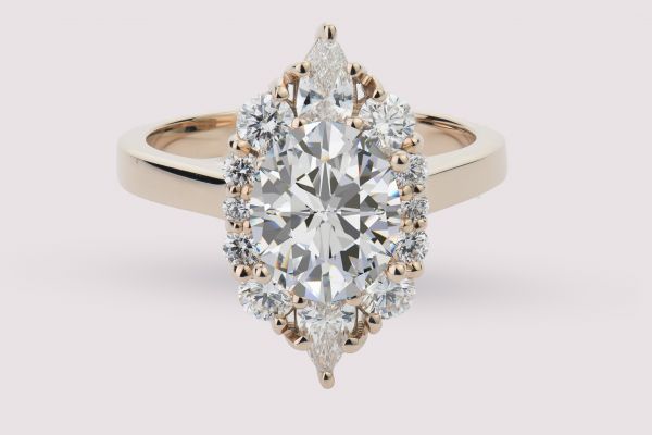 18kt Rose Gold Round And Pear Shape Fancy Halo Engagement Ring